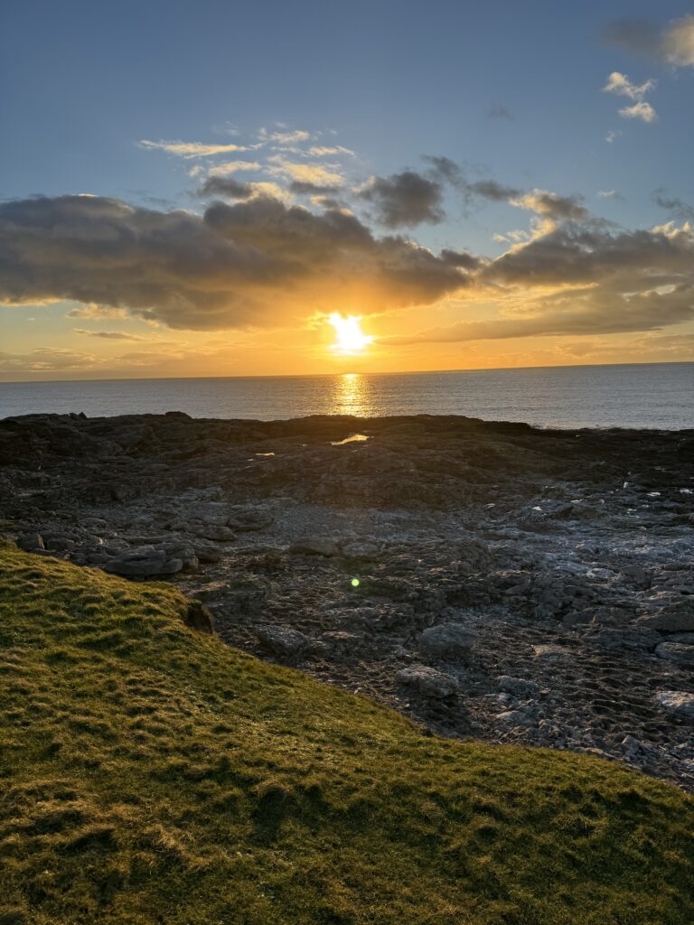 Ogmore by sea cliff and rockpools crabs fishing